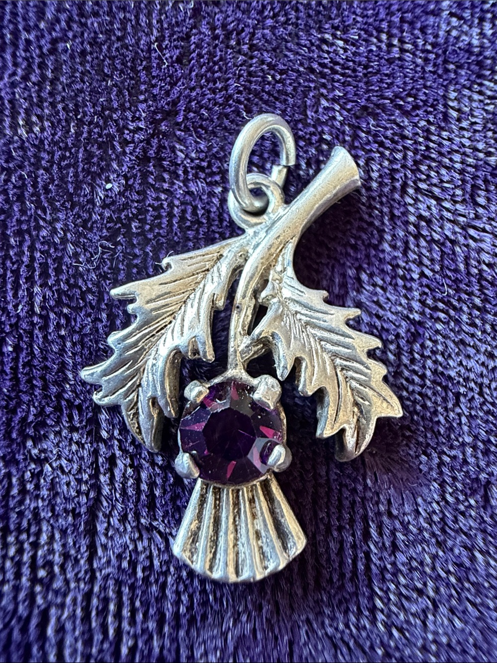 Vintage silver traditional Scottish Thistle pendant with purple rhinestone